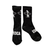 White athletic socks, cotton blend, crew length with logo detail; suitable for most adult foot sizes.