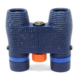 Blue binoculars with orange center on a white background