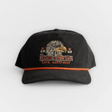 Black cotton twill hat with custom embroidery and an orange-trimmed visor, suitable for casual wear.