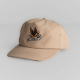 Beige cotton hat with bird and FUCK IT embroidered banner; adjustable fit for casual wear.