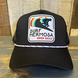 Black and white 5-panel rope trucker hat with mesh back and adjustable snap closure, suitable for daily wear.