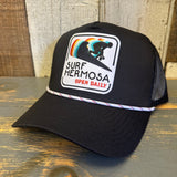Black and white 5-panel high crown rope trucker hat with snapback and front patch, suitable for casual wear.