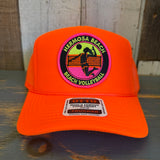 Hermosa Beach 21 • WIN BY TWO Trucker Hat - Neon Orange