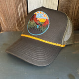 5-panel cap with cotton twill front, mesh back, gold braid detail in loden green; ideal for outdoor wear.