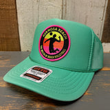 Hermosa Beach THE MECCA OF BEACH VOLLEYBALL Trucker Hat - Cactus Green