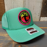 Hermosa Beach THE MECCA OF BEACH VOLLEYBALL Trucker Hat - Cactus Green
