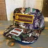Hermosa Beach AS REAL AS THE STREETS Trucker Hat - Woodland Camo