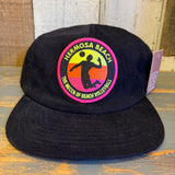 Black 6-panel micro cord hat featuring a volleyball player patch; ideal for outdoor and sports use.