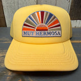 Sunset yellow foam trucker cap with sunburst design, suitable for casual wear or sun protection.