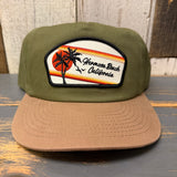 Two-tone cactus/dune workhorse hat with sunset and palm tree patch, snapback closure, sturdy material.