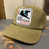 Olive-green corduroy baseball cap featuring a rectangular patch on the front.