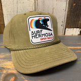 Olive green corduroy cap with a surfer patch and embroidered Surf Hermosa Open Daily text. Casual, everyday wear.