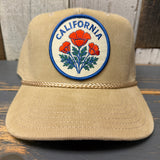 Khaki corduroy cap featuring a round California patch with orange poppies and green leaves. Suitable for casual wear.