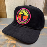 Black corduroy volleyball cap with patch, suitable for beach sports.