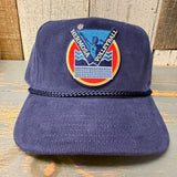 Navy blue corduroy cotton cap with volleyball patch, ideal for casual and sportswear. 100% cotton material.
