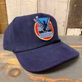 Navy corduroy volleyball cap on rustic wood surface, featuring Hermosa Beach and volleyball lettering.