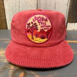 Red corduroy field trip hat with yellow and red desert patch, inspired by Joshua Tree National Park.