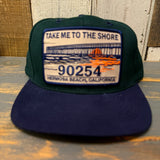Dark green and navy low profile cap featuring a TAKE ME TO THE SHORE 90254 patch, suitable for casual wear.