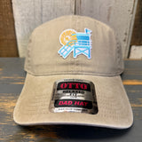 Khaki 6-panel cotton dad hat with sun and lifeguard tower embroidery, featuring an OTTO RELAXED FIT sticker.