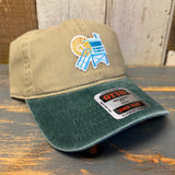 Dark green and khaki lifeguard tower dad hat, low-profile 6-panel unstructured cotton, for casual wear.