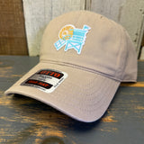 Khaki cap with embroidered lifeguard tower mini patch on a wooden surface