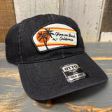 Black denim dad hat with retro sunset patch, low-profile 6-panel design for casual wear.