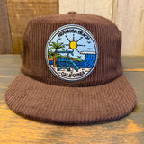 Java brown corduroy field trip hat with a beach patch design; suitable for outdoor or casual wear.