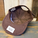 Java brown corduroy field trip hat with upturned brim and adjustable strap, designed for use at the shorefront.