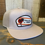 Faded bone 6-panel trucker hat with a palm tree patch and retro Hermosa Beach text, ideal for casual wear.