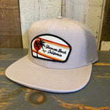 Faded bone 6-panel snapback hat with palm tree patch and Hermosa Beach CA text, casual wear.