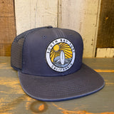 Faded navy 6-panel trucker hat with mesh back, featuring a surfboard and sun patch. Suitable for casual outdoor wear.