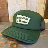Forest green foam trucker cap with recycled mesh back and a front patch; ideal for casual, outdoor wear.