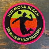 Round cloth patch in blue and white, featuring a beach volleyball player silhouette, ideal for sewing on apparel or bags.