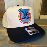 Black and natural 5-panel volleyball cap with patch detail and adjustable snapback closure, suitable for casual wear.