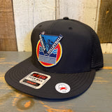 Black 6-panel snapback hat with volleyball patch, made of performance polyester, suitable for activewear.