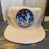 Eggshell corduroy hat featuring a desert night scene with cacti and stars; ideal for casual outdoor wear.