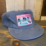 Slate blue corduroy field trip hat with a pink patch, made for outdoor use.