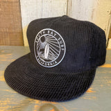 Black corduroy unstructured hat with SOUTH BAY SURF CALIFORNIA text, vintage workwear style.