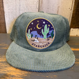 Sage green corduroy hat with desert night patch and embroidery, ideal for casual outdoor wear.