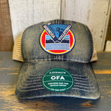 Blue denim volleyball cap with mesh back and green sticker, designed for active use.
