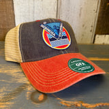 Two-tone trucker cap with navy crown, scarlet red brim, khaki mesh back, and volleyball patch; casual athletic use.
