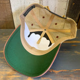 Trucker cap with white patch and brown mountain graphic, designed for casual wear.