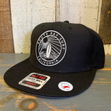 Black 5 panel snapback hat with structured front, adjustable bill, and a SOUTH BAY SURF patch.
