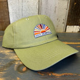 Desert green 6-panel dad hat with embroidered text, cotton material, adjustable strap—ideal for everyday wear.