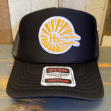 Black high crown trucker hat with sunburst Hb logo, mesh back, ideal for casual wear and sun protection.