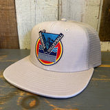 Faded bone volleyball trucker hat with mesh back, designed for outdoor sports use.