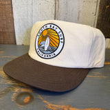 Two-tone Java/Natural workhorse hat with multicolor patch and snapback; durable for casual or outdoor use.