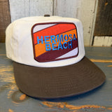 Two-tone workhorse hat in java and natural colors, cotton material, for outdoor activities, displayed on wooden surface.
