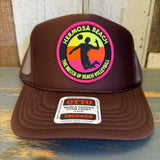 Brown mesh trucker hat with a rectangular front patch, suitable for casual or outdoor wear.