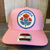 Pink mid-profile five-panel cap with a California patch and poppy flower design, suitable for casual wear.